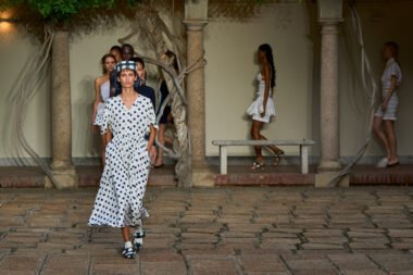 A female model walking on Vivetta's SS 24 Polka Dot Collection runway presentation at Milan Fashion Week 2023