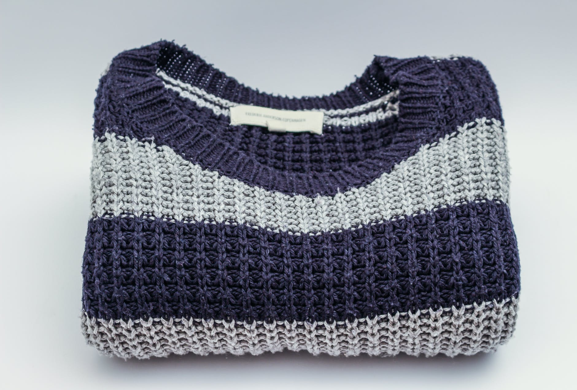 gray and black striped crew neck top