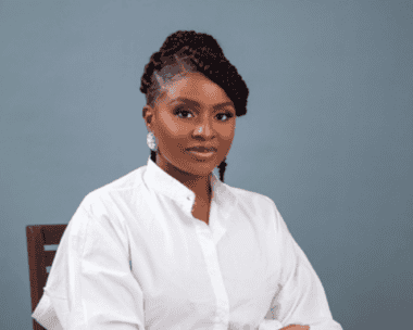A portrait photograph of a Dr Inya Lawal, the founder of Africa Creative Market