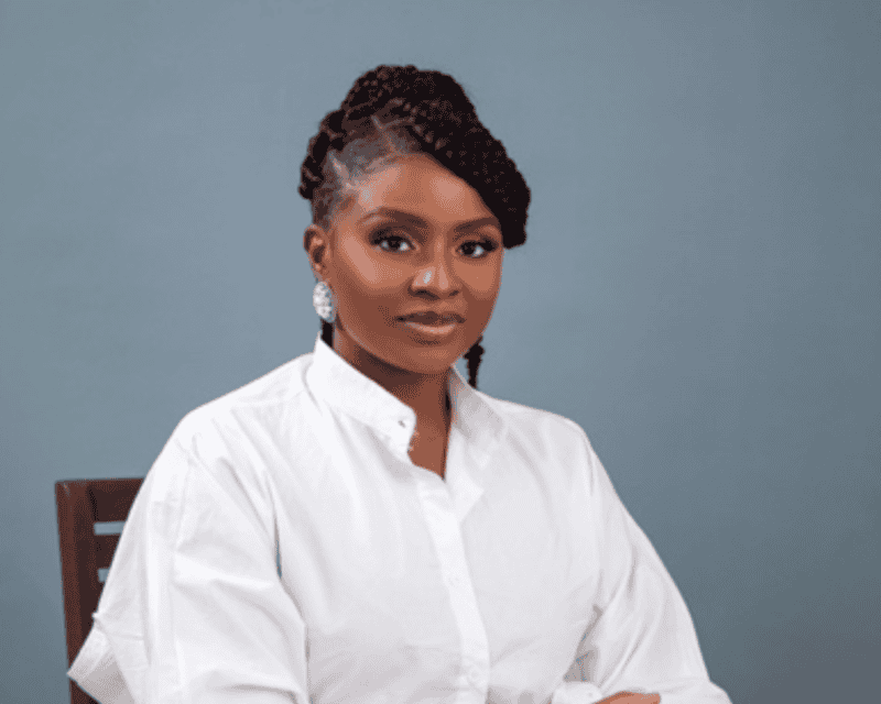 A portrait photograph of a Dr Inya Lawal, the founder of Africa Creative Market