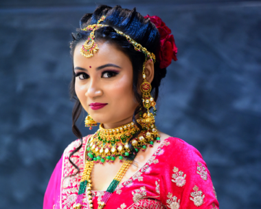 A vibrant collection of Indian necklaces, bangles, and earrings showcasing the beauty of maximalist accessorizing in Indian fashion