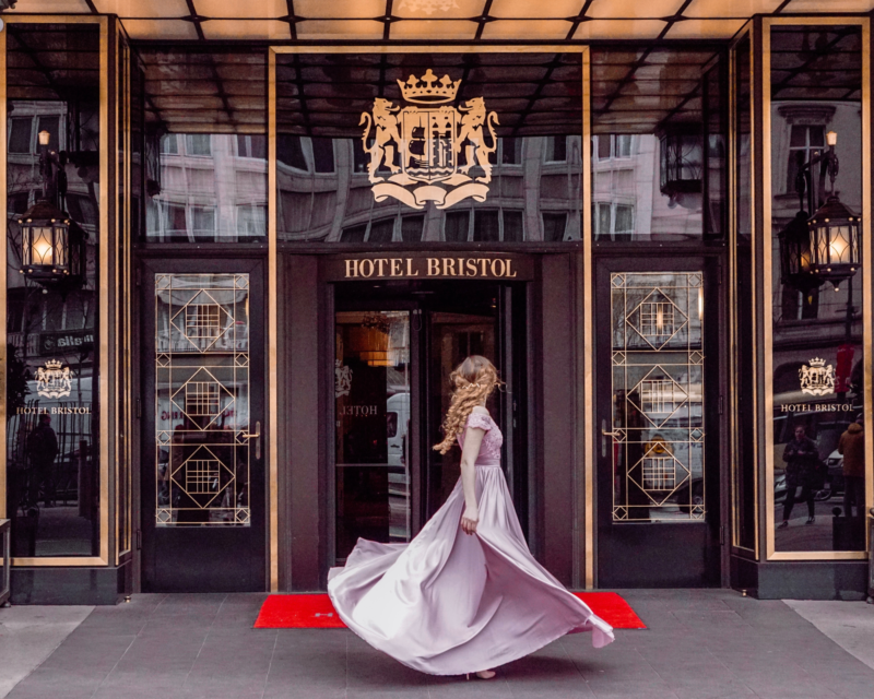 A glimpse into the luxury accommodations at The Hotel Bristol, featuring 150 exclusive rooms and 24 distinctive suites, all with stunning views over the city.