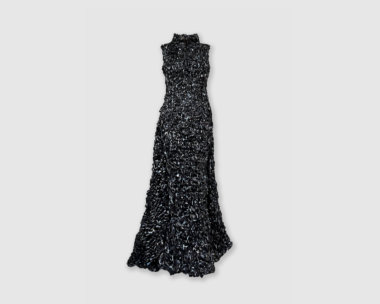 Fashion meets vintage tech as Donata Wenders shows off her Cruba dress made from VCR tapes at the Oscar event.