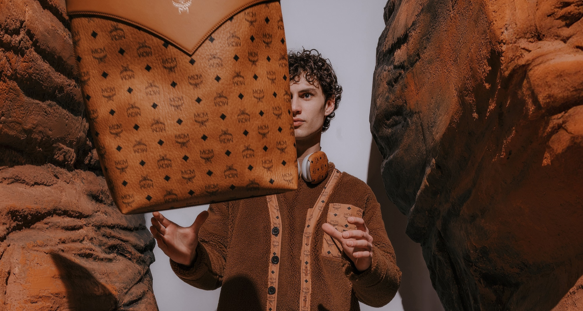 A glimpse into the Mcm AW24 Collection, From Munich To Mars, highlighting the blend of traditional craftsmanship and interstellar fashion concepts