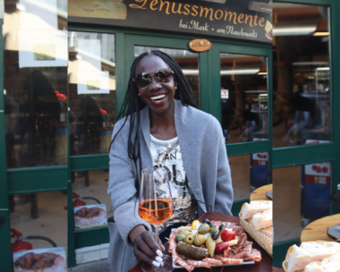 Colorful display of Naschmarkt's epicurean offerings at Genuss Momente, inviting food lovers in Vienna