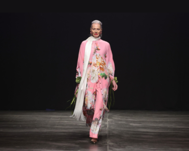 Marcel Ostertag AW 2024 Collection piece featuring floral motifs in a dark setting, blending elegance with a mysterious ambiance.