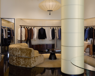 Interior view of the newly opened Blazé Milano flagship store in Milan featuring luxurious clothing racks and chic decor
