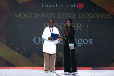 Most Innovative Designer receiving award at Lagos Leather Fair Awards 2023