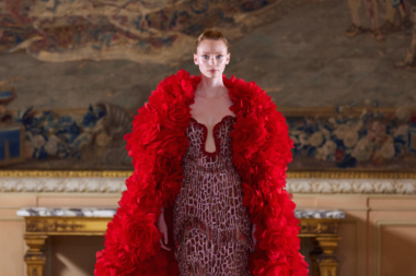A stunning showcase of Tony Ward Couture's Nymphs Rebirth at Paris Couture Week FW 24/25 featuring a model in a flowing, detailed dress
