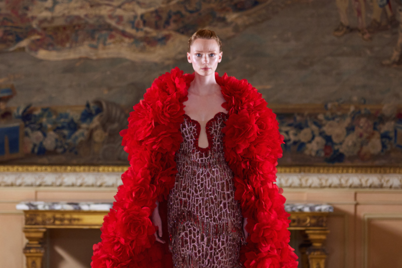 A stunning showcase of Tony Ward Couture's Nymphs Rebirth at Paris Couture Week FW 24/25 featuring a model in a flowing, detailed dress
