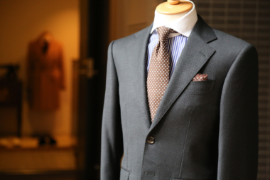 Elegant men's summer suit displayed, ideal for formal occasions during the hotter months.