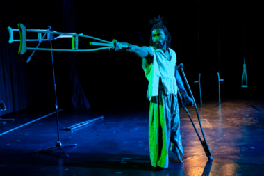 Joseph Tebandeke Mberekedde on stage performing