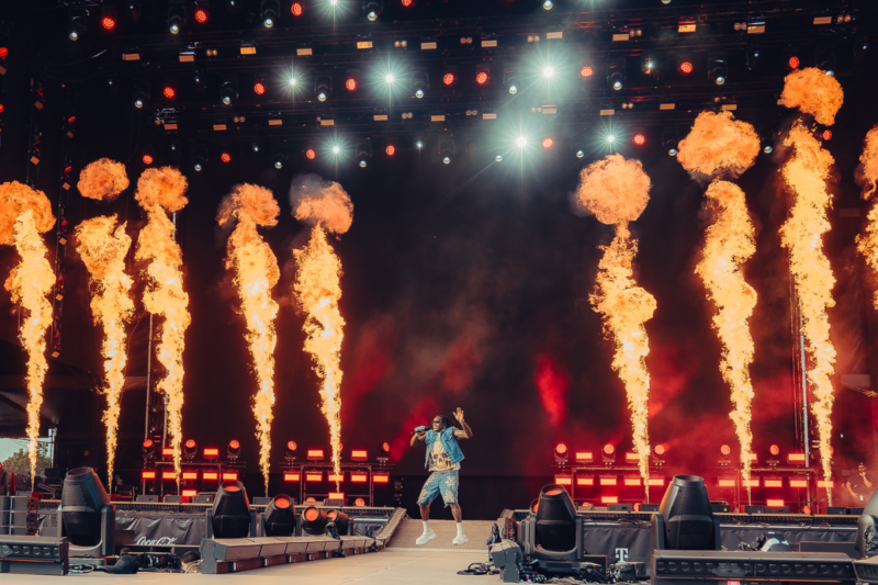 Electrifying Rolling Loud 2024 performance by Nicki Minaj, Travis Scott, and Playboi Carti. An artist perfoming on stage at the event
