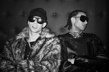 Music artists Uneek Flow and Cledos in a dynamic urban setting, photo by Jesse Koch