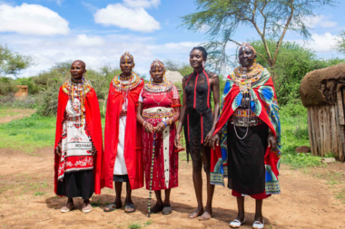 Maasai Women in their beads, posing fro photography during Sharon Wendo's SAEN project in Kenya