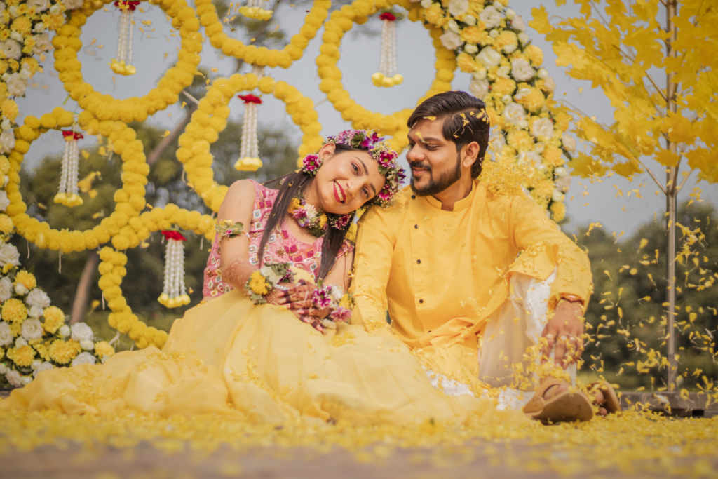 Indian bride and groom wearing yellow – Asian wedding ceremony"
