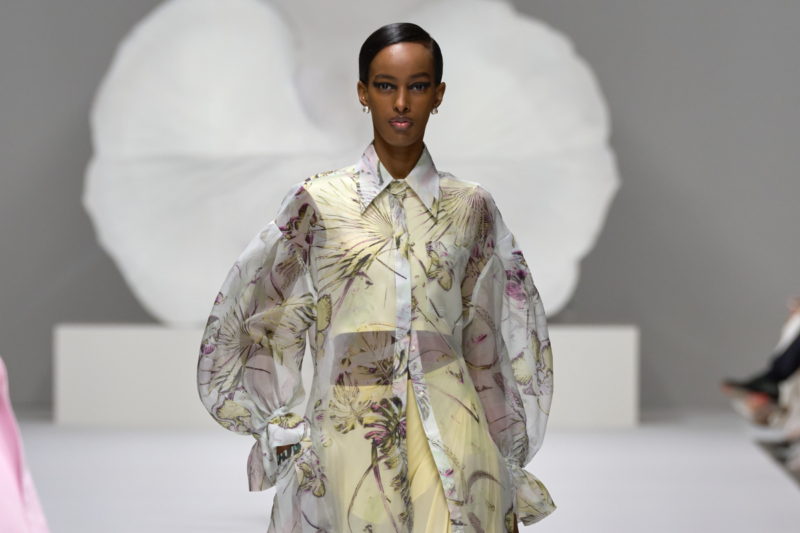 Model on Genny orchid prints on silk twill blouse for Genny SS25 runway show at Milan Fashion Week
