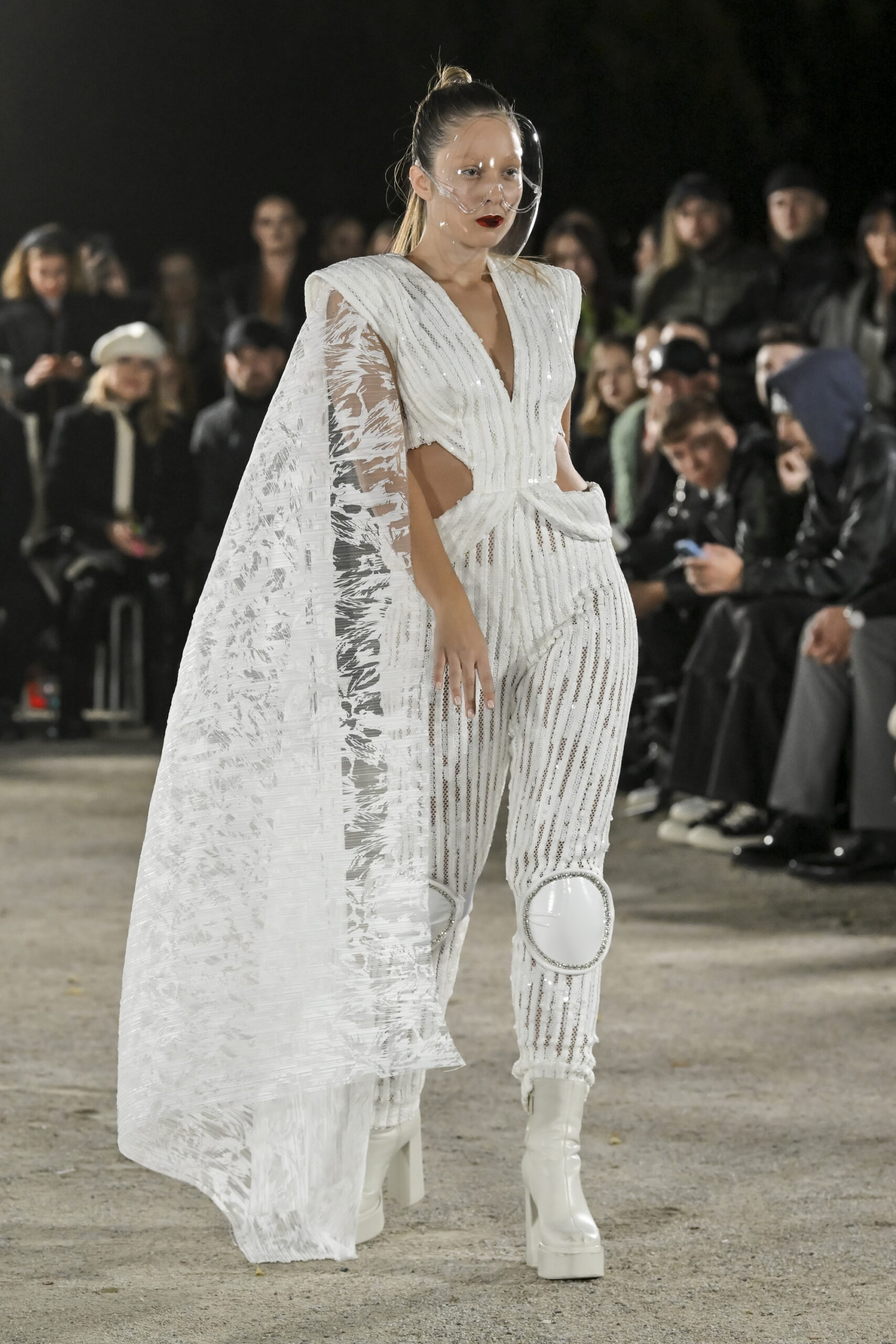 Models on a chessboard-inspired runway during Mercedes-Benz Fashion Live! 2024