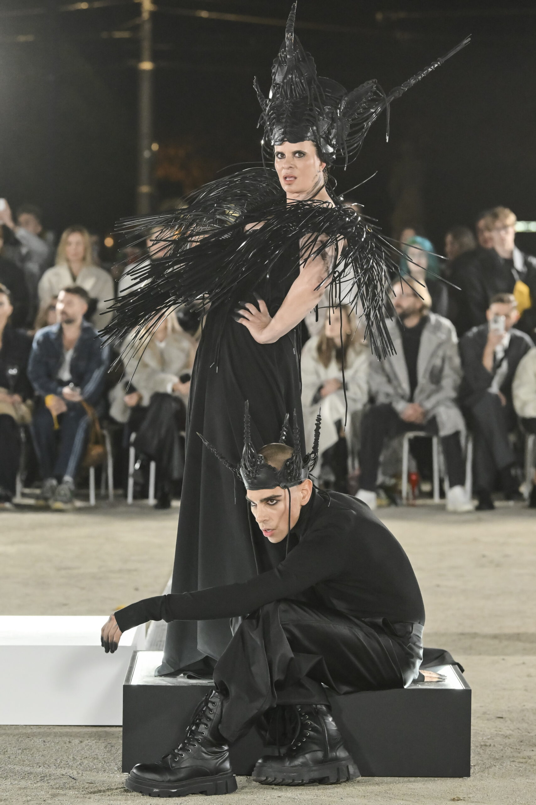 Models on a chessboard-inspired runway during Mercedes-Benz Fashion Live! 2024