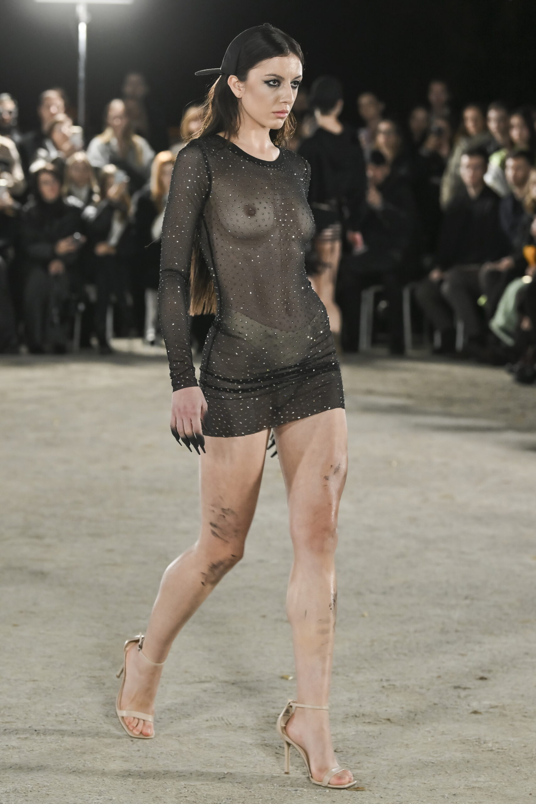 Models on a chessboard-inspired runway during Mercedes-Benz Fashion Live! 2024