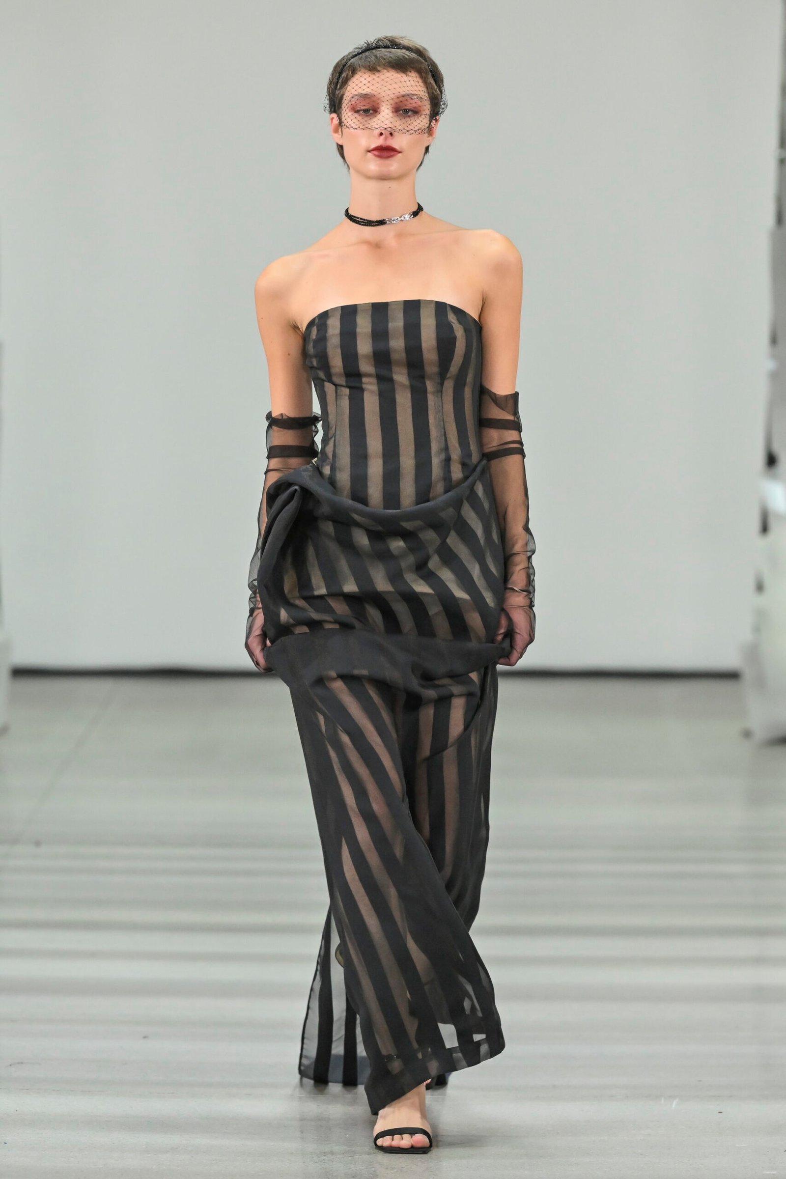 Veronika Kostková's Belle Époque-inspired collection at Mercedes-Benz Fashion Live 2024 merges historical elegance with modern fashion.