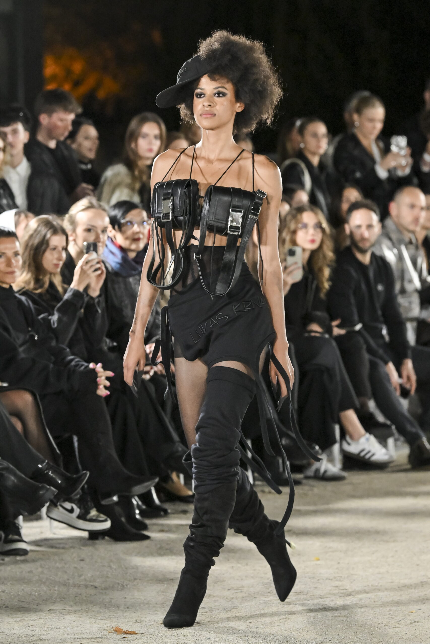 Models on a chessboard-inspired runway during Mercedes-Benz Fashion Live! 2024