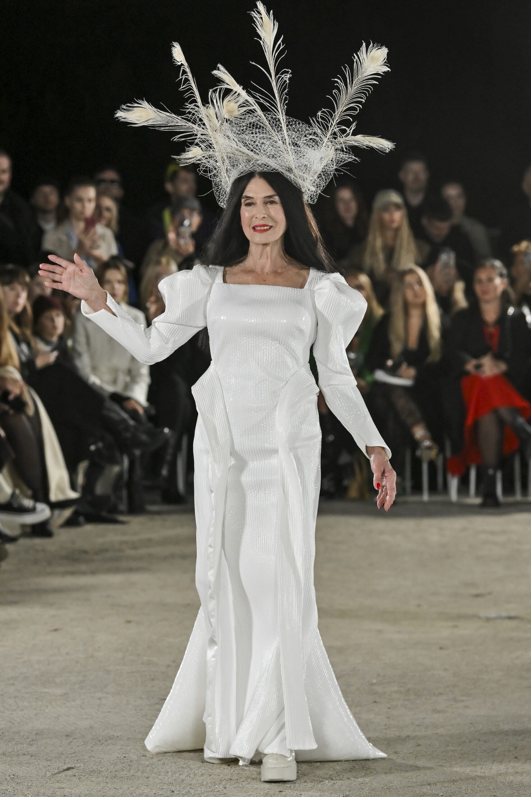 Models on a chessboard-inspired runway during Mercedes-Benz Fashion Live! 2024