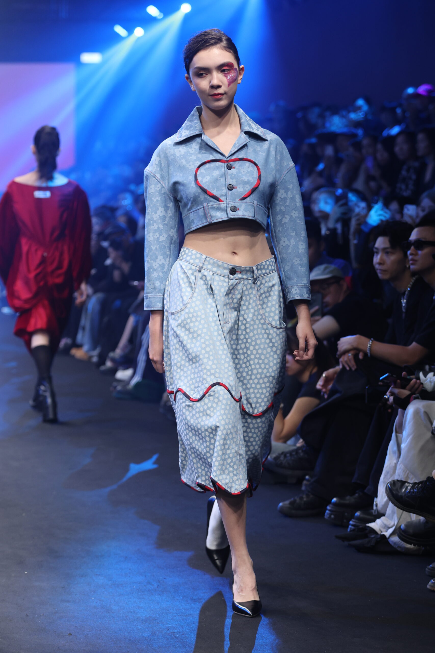 Model showcasing a gender-fluid outfit from #DAMUR's SS25 collection, inspired by love and upcycled fashion