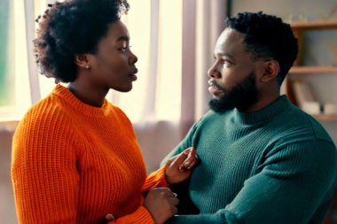 A couple having a conversation to resolve relationship conflict, while using Repair attempts during relationship conflict with a soft touch