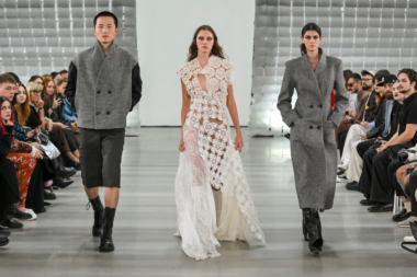 Designer Monika Mandač presents bold asymmetric fashion at Mercedes-Benz Fashion Live 2024, blending raw materials and elegant cuts.