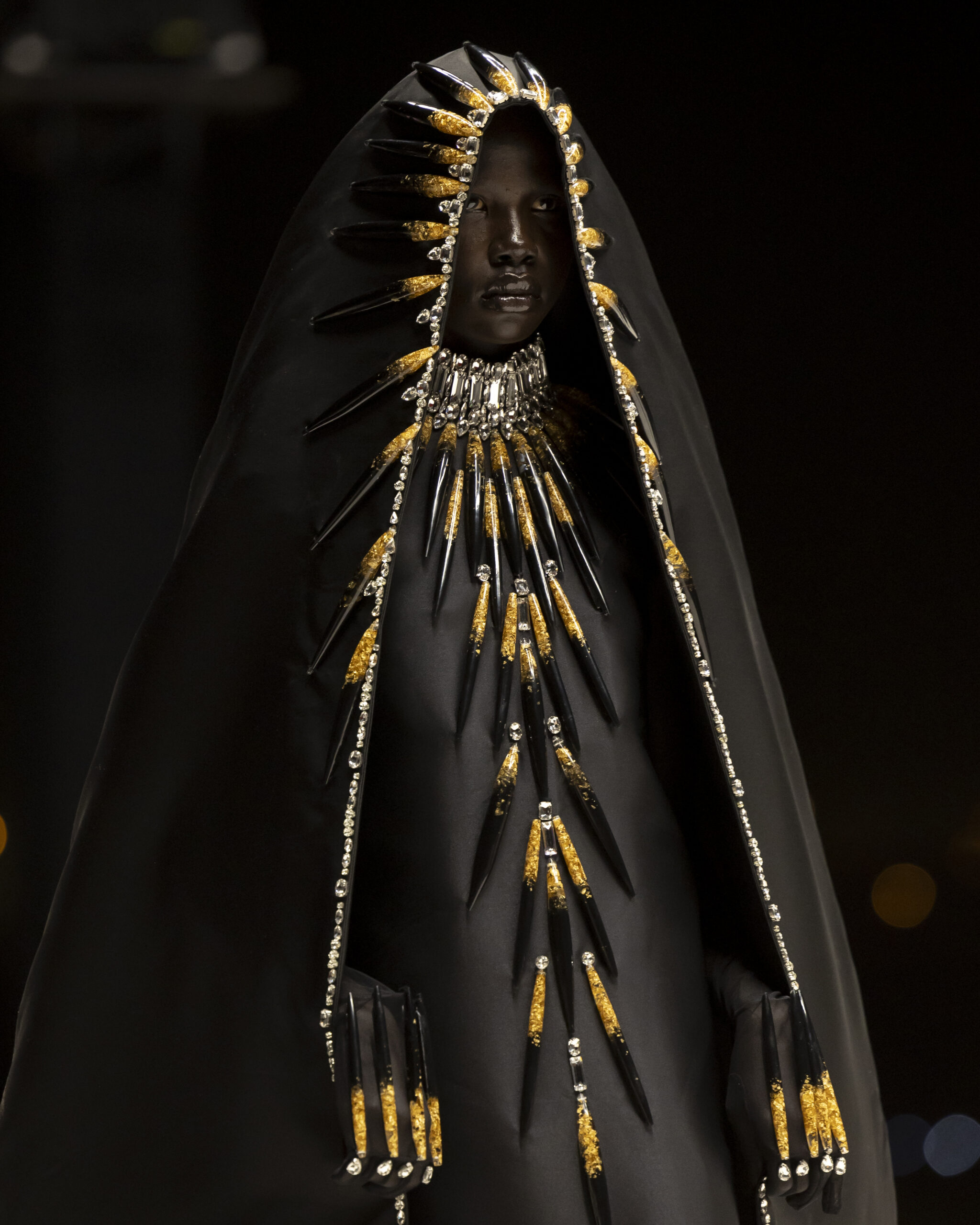 Models showcasing Saudi couture at Riyadh Fashion Week, blending tradition and modernity.