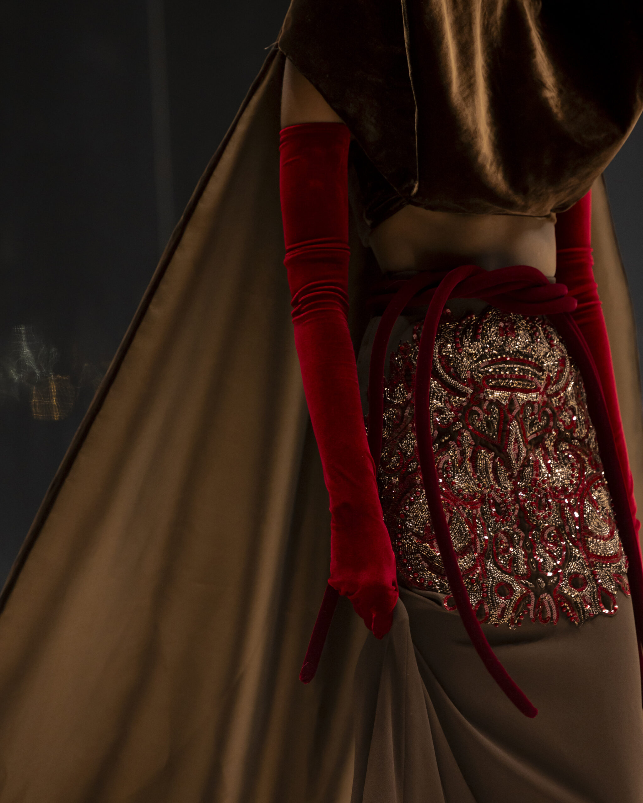 Models showcasing Saudi couture at Riyadh Fashion Week, blending tradition and modernity.