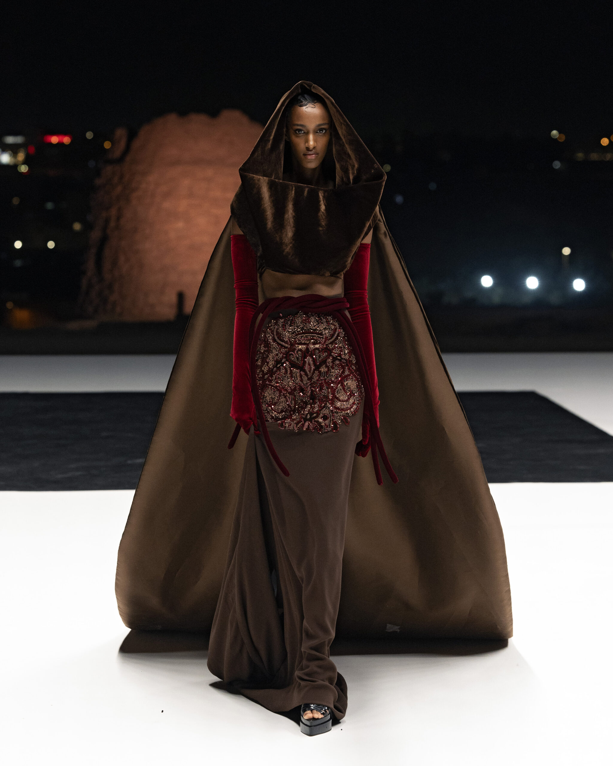 Models showcasing Saudi couture at Riyadh Fashion Week, blending tradition and modernity.