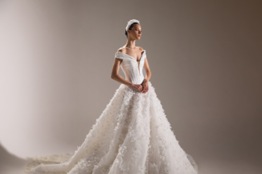 Tony Ward Bridal Fall 2025 gown with cascading lace and floral details.