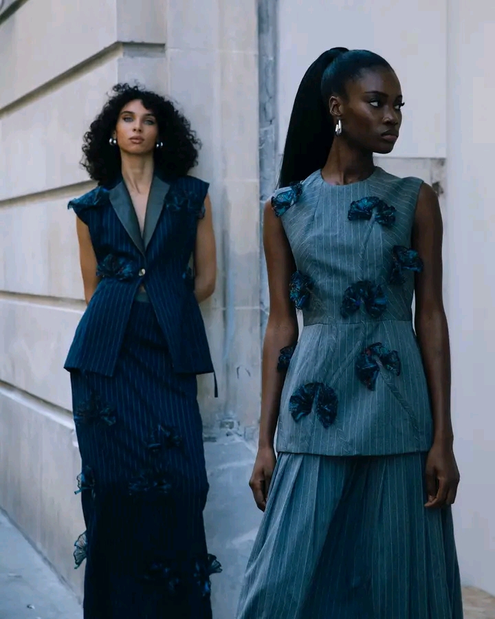 Model wearing a Christie Brown Ava top and Ruby skirt from the Fall 2024 Clarity Collection.