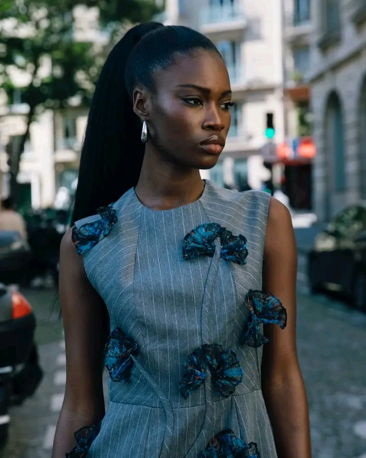 Model wearing a Christie Brown Ava top and Ruby skirt from the Fall 2024 Clarity Collection.