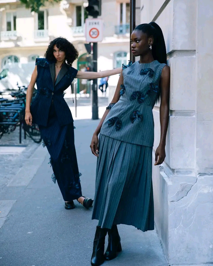 Model wearing a Christie Brown Ava top and Ruby skirt from the Fall 2024 Clarity Collection.