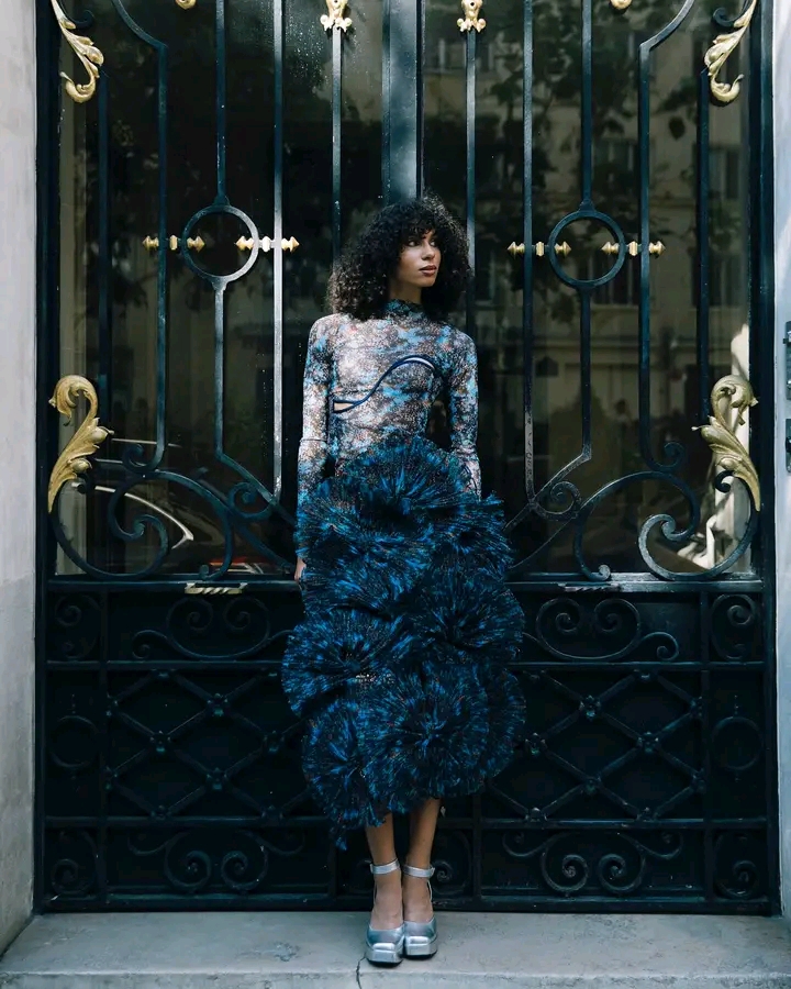 Model wearing a Christie Brown Ava top and Ruby skirt from the Fall 2024 Clarity Collection.