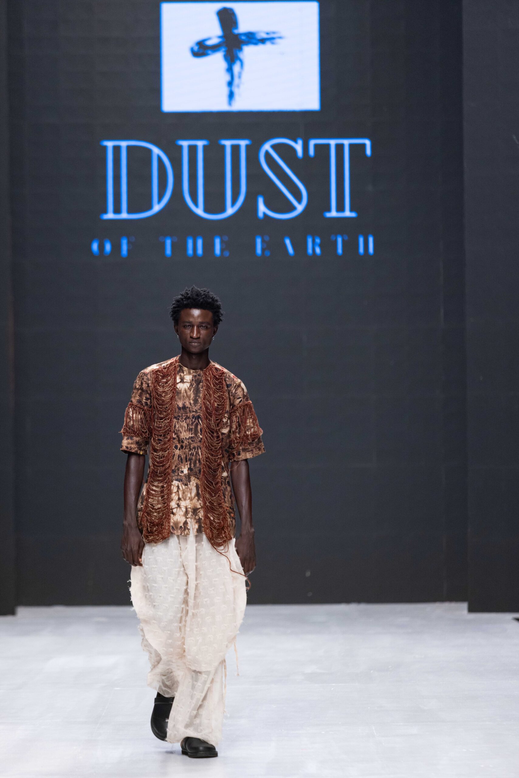 Models on Lagos Fashion Week 2024 runway, showcasing Nigerian designs with African textiles and vibrant street style.
