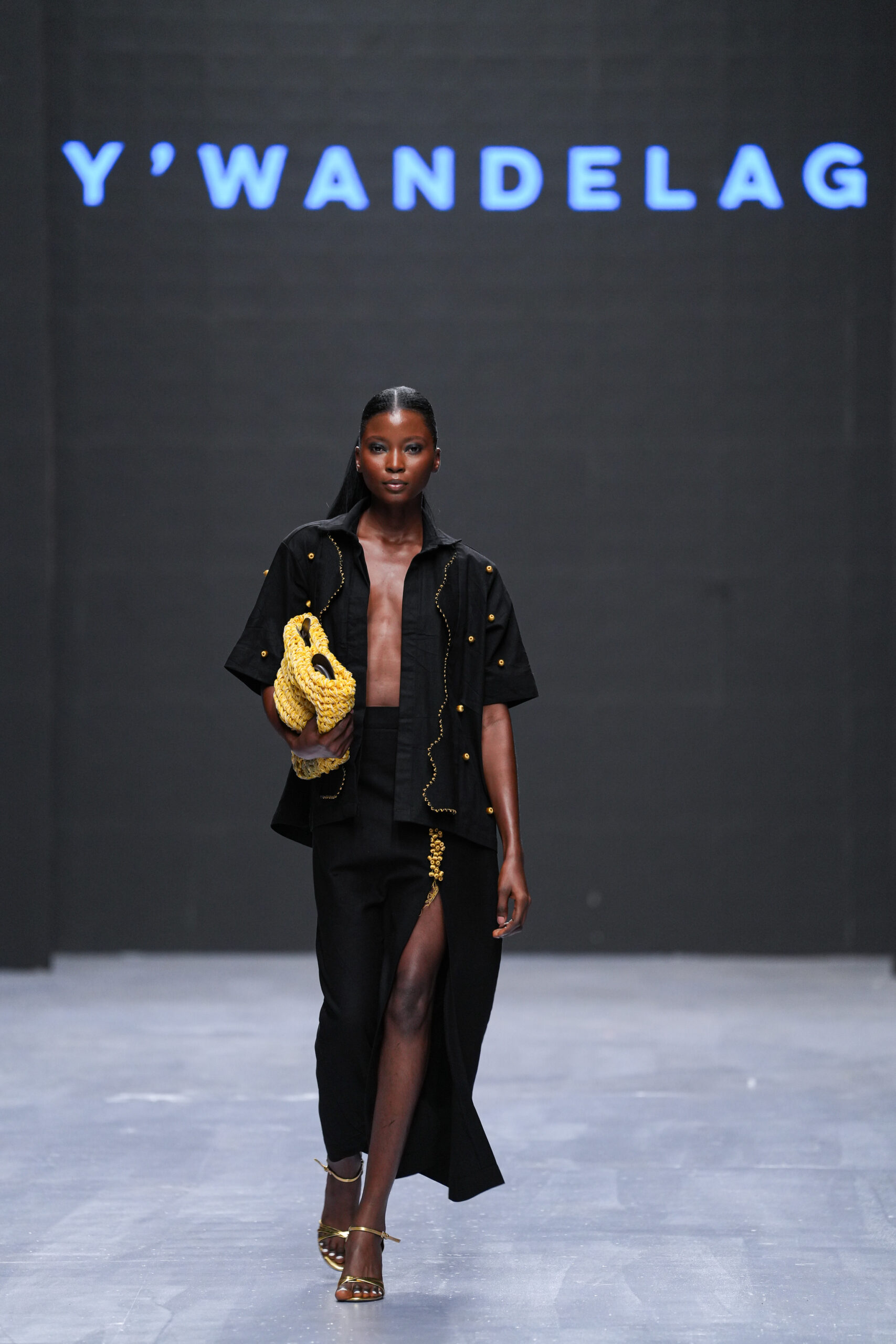 Models on Lagos Fashion Week 2024 runway, showcasing Nigerian designs with African textiles and vibrant street style.