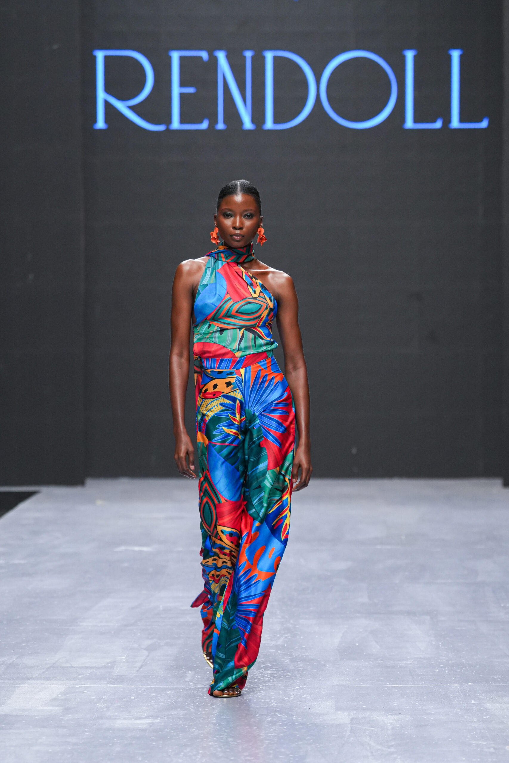 Models on Lagos Fashion Week 2024 runway, showcasing Nigerian designs with African textiles and vibrant street style.