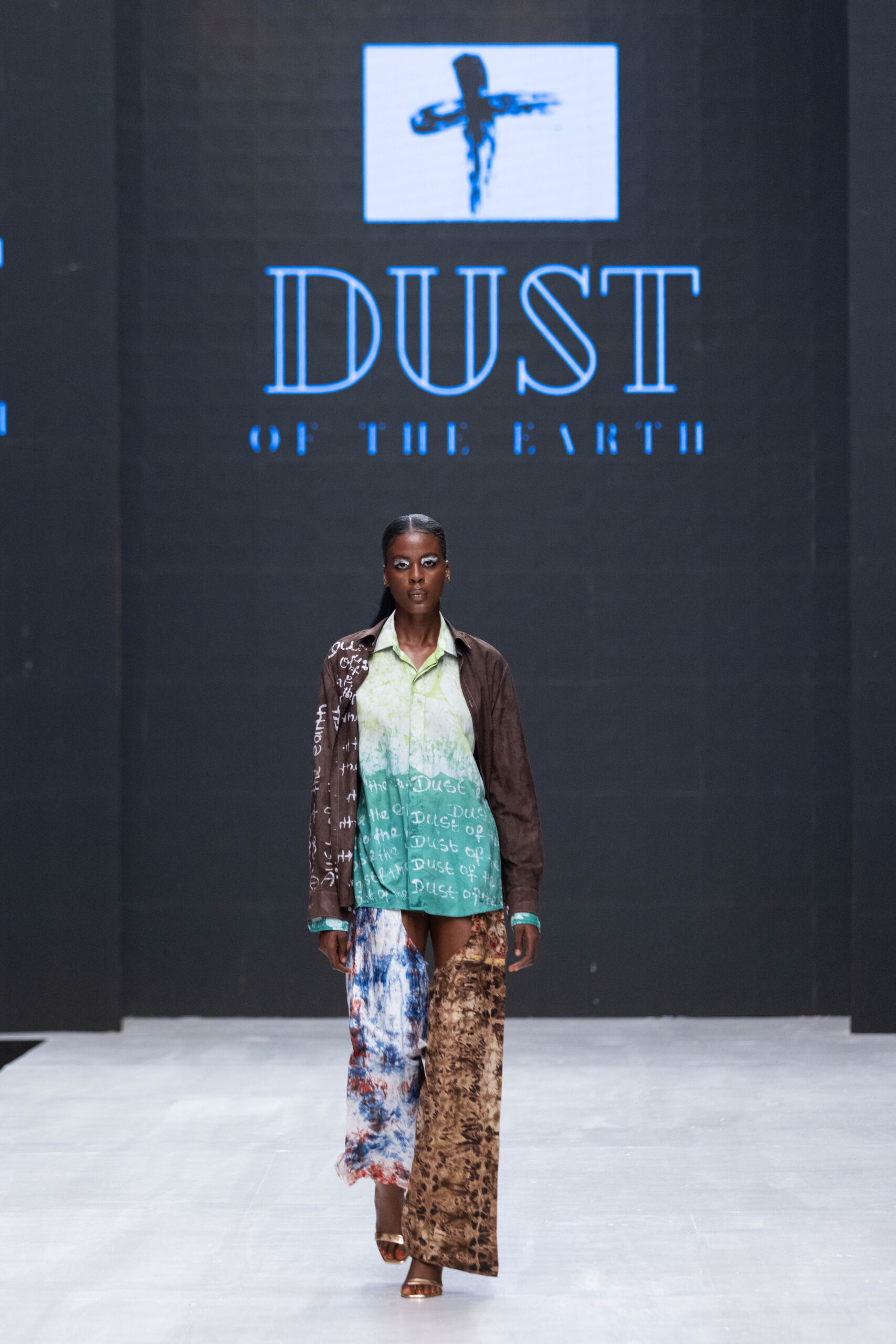 Models on Lagos Fashion Week 2024 runway, showcasing Nigerian designs with African textiles and vibrant street style.