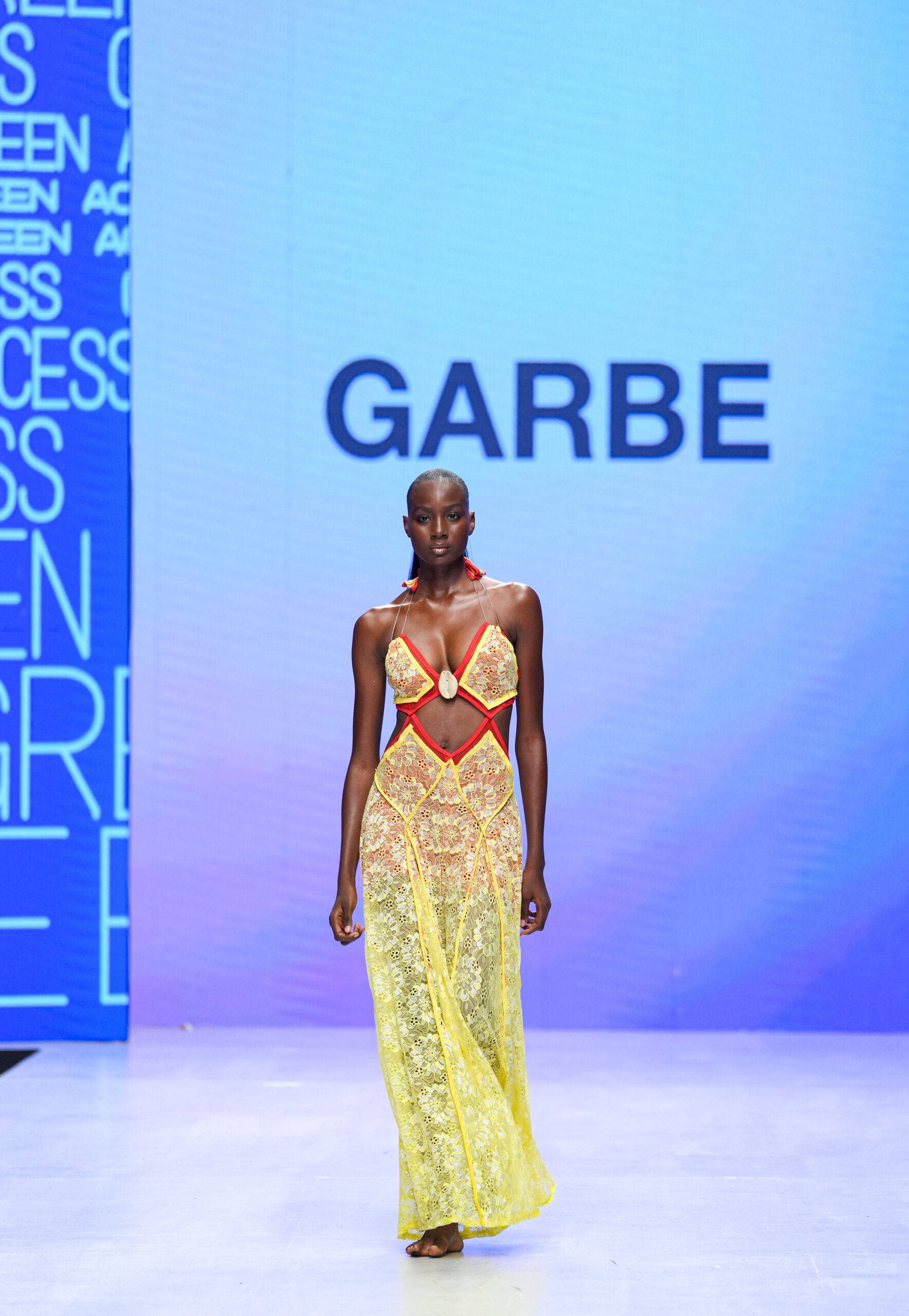 Models on Lagos Fashion Week 2024 runway, showcasing Nigerian designs with African textiles and vibrant street style.