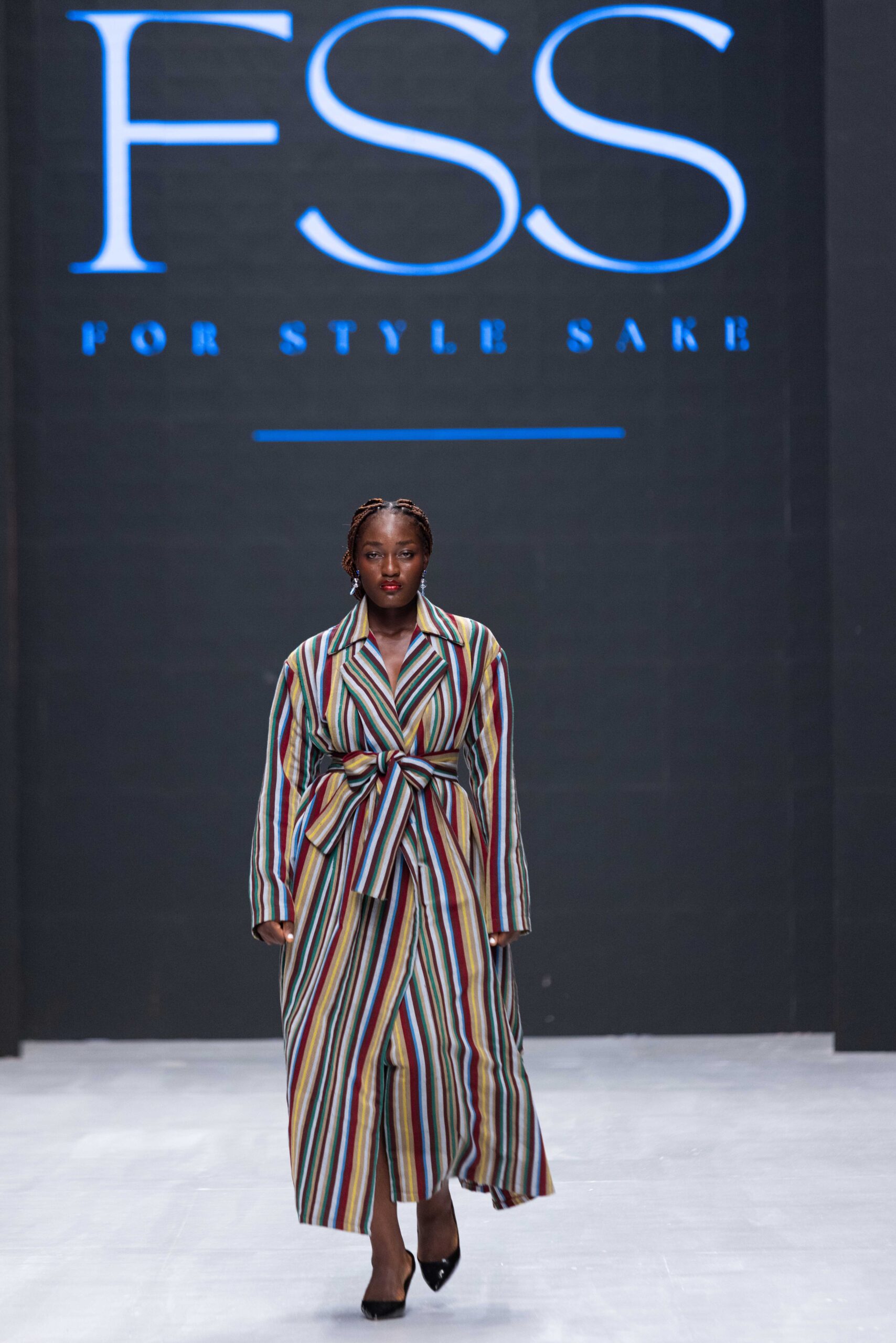 Models on Lagos Fashion Week 2024 runway, showcasing Nigerian designs with African textiles and vibrant street style.