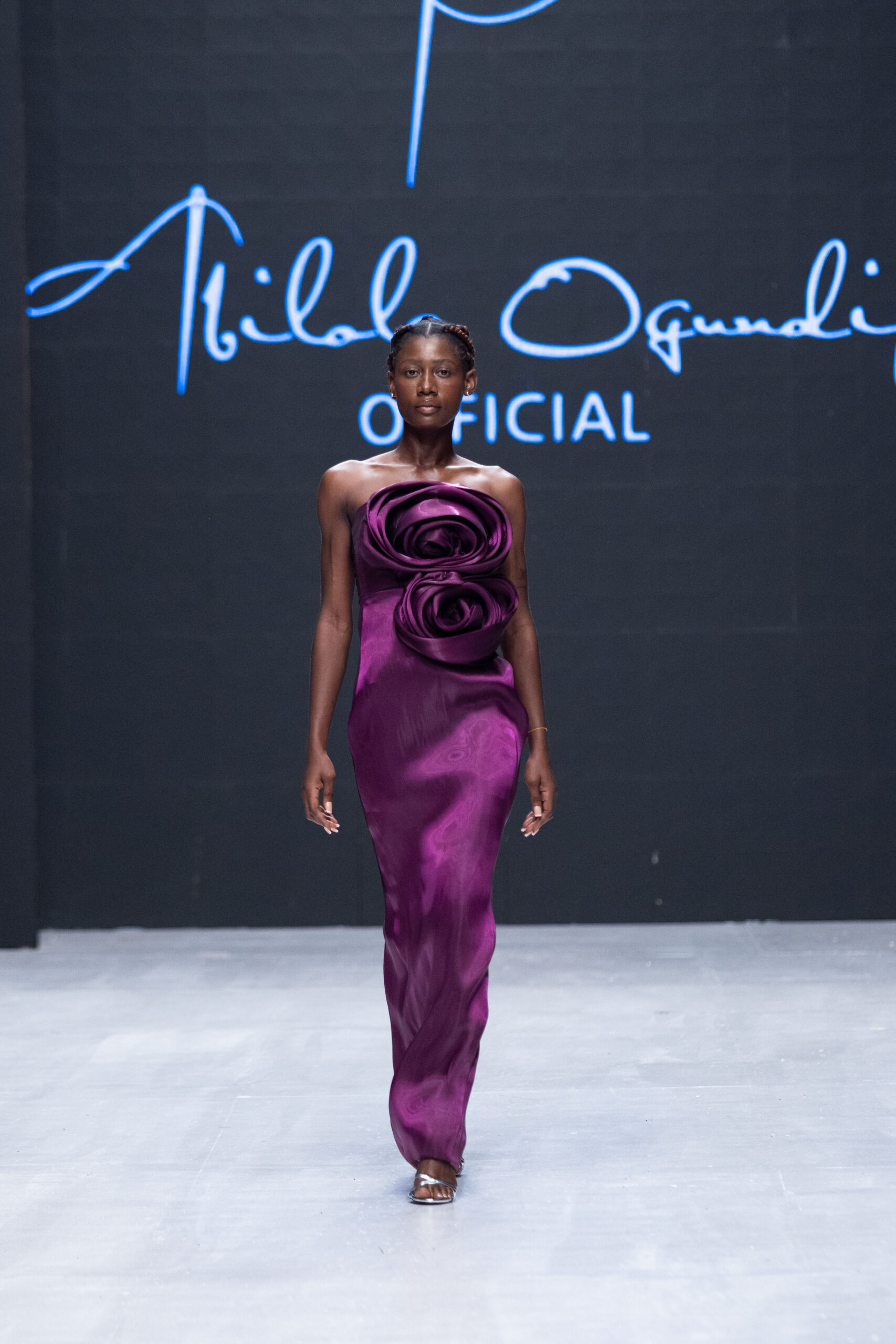 Models on Lagos Fashion Week 2024 runway, showcasing Nigerian designs with African textiles and vibrant street style.