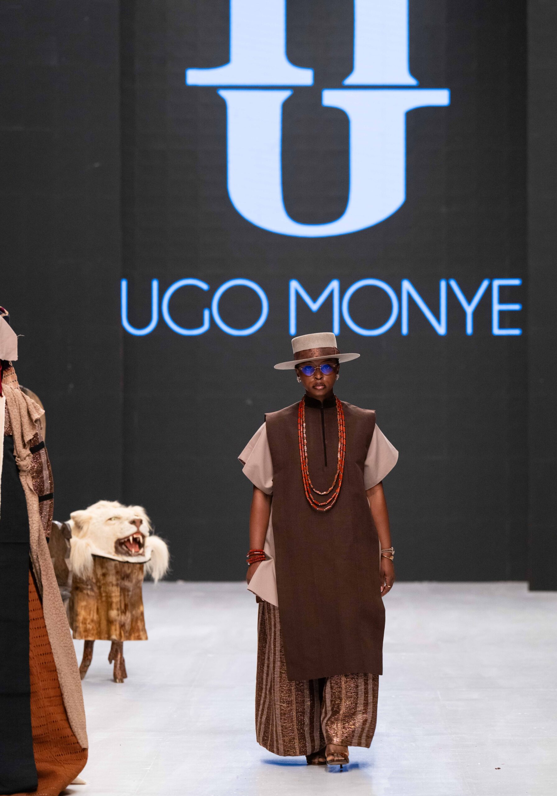 Models on Lagos Fashion Week 2024 runway, showcasing Nigerian designs with African textiles and vibrant street style.