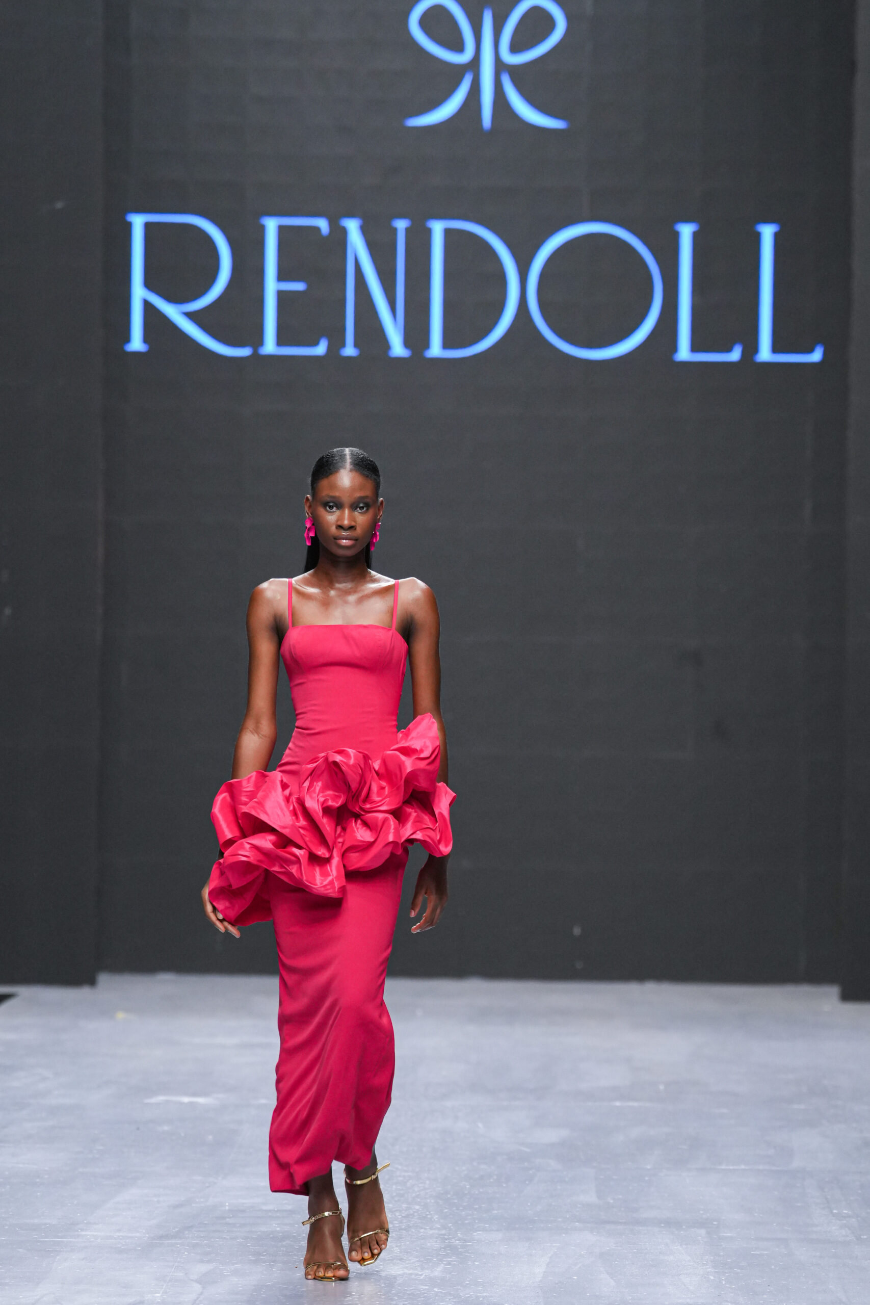 Models on Lagos Fashion Week 2024 runway, showcasing Nigerian designs with African textiles and vibrant street style.