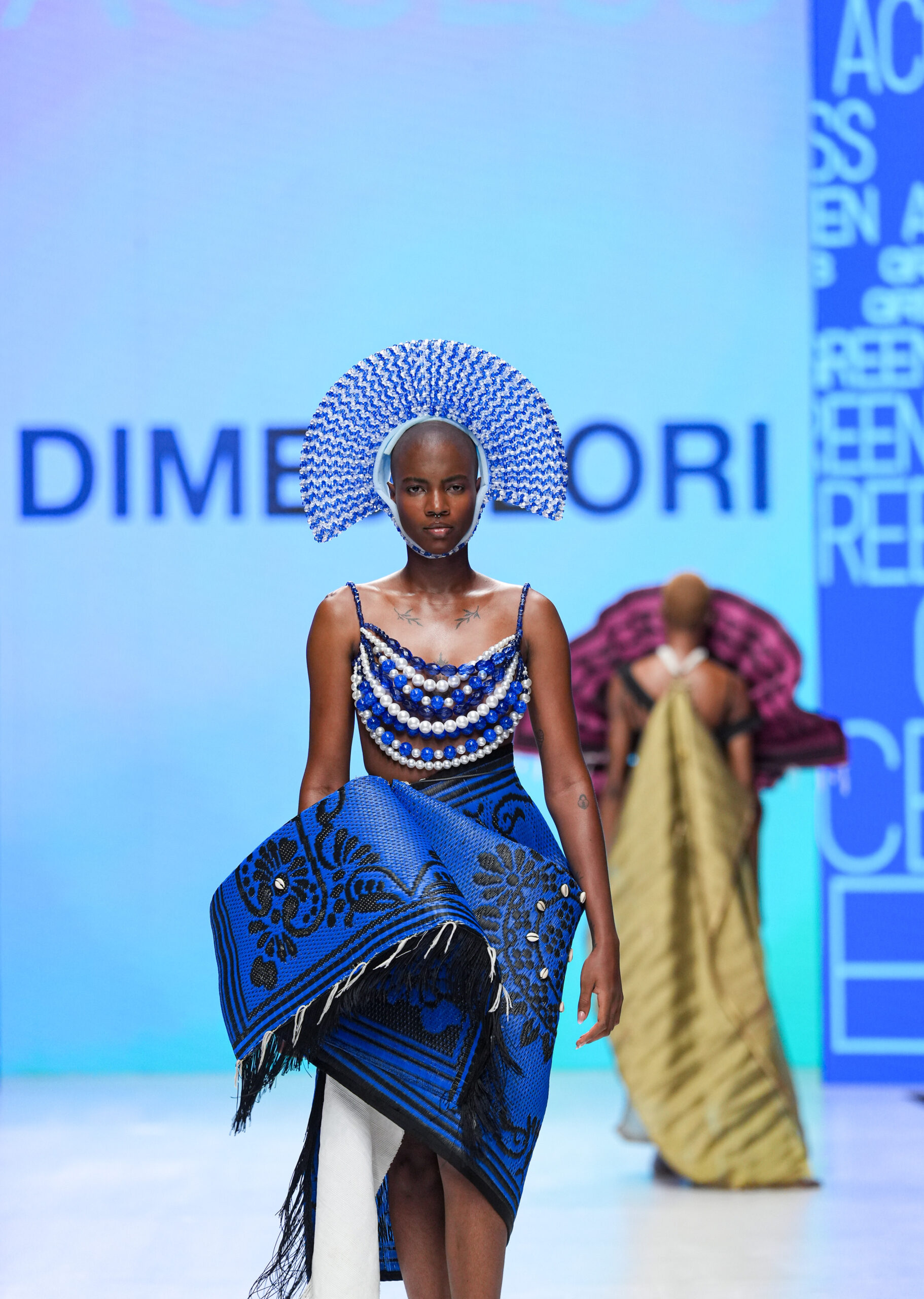 Models on Lagos Fashion Week 2024 runway, showcasing Nigerian designs with African textiles and vibrant street style.