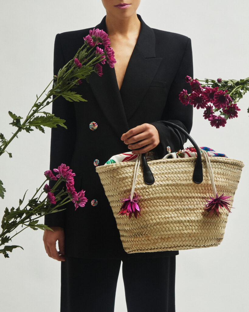 Luxury accessories showcasing fringes made from leather scraps, emphasizing J'ESSENTIA's commitment to sustainability.