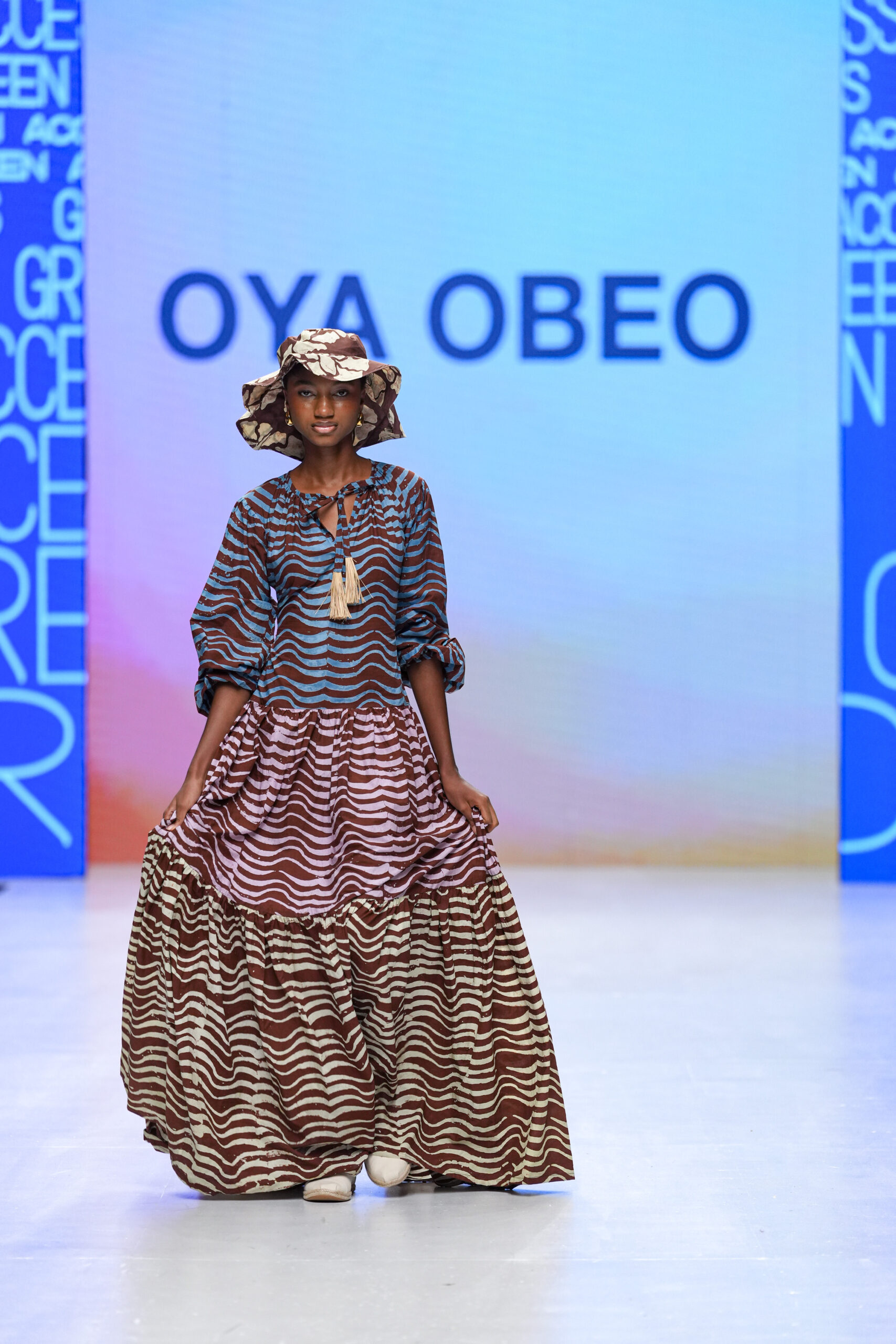 Models on Lagos Fashion Week 2024 runway, showcasing Nigerian designs with African textiles and vibrant street style.